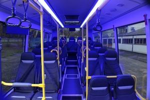 (Interior view of accessible city bus with foldable seats and ramp iveco front low entry omnicar [de])