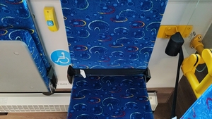 (EV minibus with wheelchair ramp and kneeling system [de])