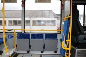 (Interior view of electric city minibus with standing area and foldable seats Omnicar electric minibus [de])