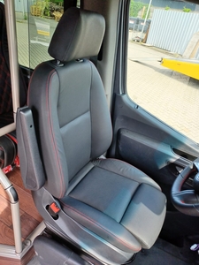 Minibus driver cockpit with digital tachograph and cruise control omnicar