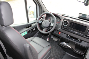 Details of the driving position of the new Mercedes Sprinter VIP 24 passengers, with a 10" MBUX touchscreen and modern finishes